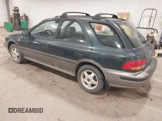 1996 Subaru Impreza Outback Special Sports with VIN JF1GF4858TH810489, listed as a IAAI auction lot 41361018 with 204,924 mi miles and . Bid and sale history available at DreamBid. Image 3.