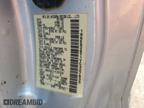 2000 Nissan Frontier XE with VIN 1N6ED26T1YC327635, listed as a Copart auction lot 43149525 with 922,578 mi miles and Salvage title. Bid and sale history available at DreamBid. Image 12.