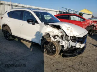 2022 Mazda CX-5 2.5 Turbo with VIN JM3KFBAY7N0597010, listed as a Copart auction lot 83062114 with 18,136 mi miles and Salvage Title. Bid and sale history available at carsss.com. Image 4.
