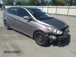 2014 Hyundai Accent GS z VIN KMHCT5AE6EU157393, wystawiony jako IAAI lot #42188160 z przebiegiem 221 375 mil mil oraz . Historia ofert i sprzedaży dostępna na DreamBid. Obrazek 1.