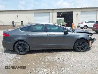 2020 Ford Fusion SE z VIN 3FA6P0HD6LR160147, wystawiony jako IAAI lot #42499983 z przebiegiem 73 971 mil mil oraz . Historia ofert i sprzedaży dostępna na DreamBid. Obrazek 14.