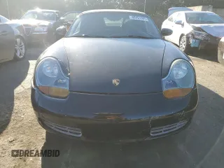 2000 Porsche Boxster z VIN WP0CA2983YU621686, wystawiony jako Copart lot #88951585 z przebiegiem 127 276 mil mil oraz Tytuł czysty. Historia ofert i sprzedaży dostępna na DreamBid. Obrazek 5.
