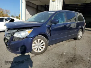 2014 Volkswagen Routan SE z VIN 2C4RVABG7ER134462, wystawiony jako Copart lot #76492444 z przebiegiem 93 373 mil mil oraz Szkoda całkowita • Salvage title. Historia ofert i sprzedaży dostępna na DreamBid. Obrazek 1.