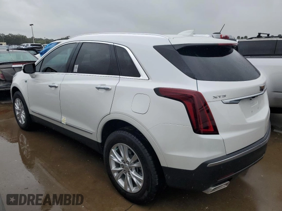 2022 Cadillac XT5 FWD Luxury z VIN 1GYKNAR48NZ163921, wystawiony jako Copart lot #74507874 z przebiegiem 5 723 mil mil oraz Nie do naprawy • Non repairable. Historia ofert i sprzedaży dostępna na DreamBid. Obrazek 2.