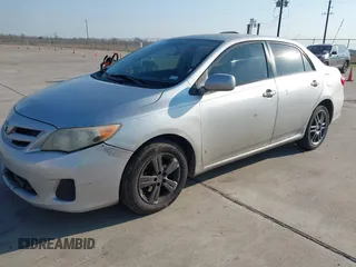 2011 Toyota Corolla L with VIN JTDBU4EE0BJ102517, listed as a IAAI auction lot 41702532 with 296,646 mi miles. Bid and sale history available at carsss.com. Image 2.