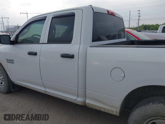 2014 Ram 1500 Tradesman with VIN 1C6RR6FGXES438824, listed as a IAAI auction lot 42301571 with 187,755 mi miles and . Bid and sale history available at DreamBid. Image 14.