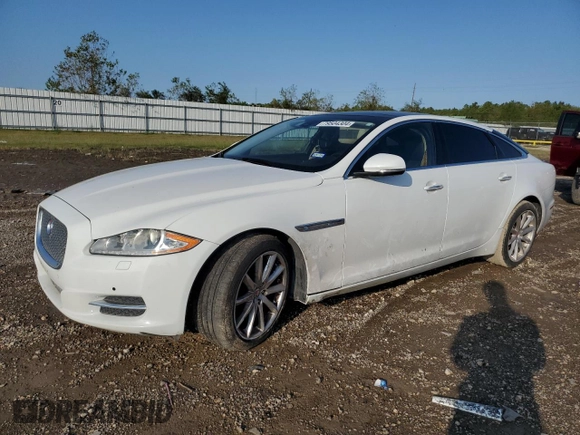 2014 Jaguar XJ Portfolio with VIN SAJWA2GZ3E8V60788, listed as a Copart auction lot 43272405 with 97,196 mi miles and Salvage title. Bid and sale history available at DreamBid. Image 1.