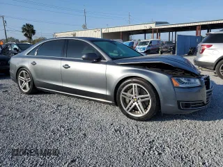 2015 Audi A8 L 4.0T with VIN WAU32AFD4FN041442, listed as a Copart auction lot 43708295 with 132,579 mi miles and Salvage Title. Bid and sale history available at carsss.com. Image 4.