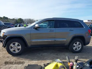 2013 Jeep Grand Cherokee Laredo with VIN 1C4RJEAG0DC616413, listed as a IAAI auction lot 41345278 with 157,875 mi miles. Bid and sale history available at carsss.com. Image 14.