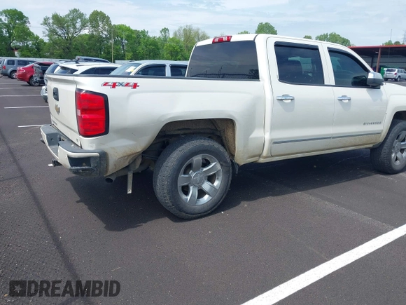 2015 Chevrolet Silverado 1500 LT with VIN 3GCUKREC1FG392218, listed as a IAAI auction lot 42094309 with 140,915 mi miles and . Bid and sale history available at DreamBid. Image 4.