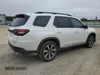2024 Honda Pilot Touring z VIN 5FNYG2H74RB011187, wystawiony jako Copart lot #79999324 z przebiegiem 16 123 mil mil oraz Szkoda całkowita • Salvage title. Historia ofert i sprzedaży dostępna na DreamBid. Obrazek 3.