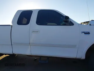 1999 Ford F-150 XL с VIN 1FTRX18L0XKB29703, выставлен на аукционе IAAI как лот 41644163 с пробегом Не указан миль и . История ставок и продаж доступна на DreamBid. Изображение 13.