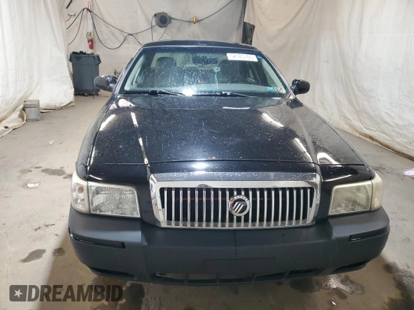 2010 Mercury Grand Marquis LS z VIN 2MEBM7FV6AX628705, wystawiony jako Copart lot #52185105 z przebiegiem 139 485 mil mil oraz Szkody całkowita. Historia ofert i sprzedaży dostępna na DreamBid. Obrazek 5.