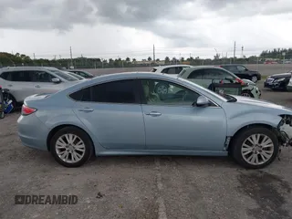 2009 Mazda 6 i Touring with VIN 1YVHP82AX95M19535, listed as a IAAI auction lot 41987285 with 129,111 mi miles and . Bid and sale history available at carsss.com. Image 14.