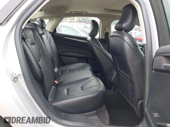 2017 Ford Fusion Hybrid Titanium z VIN 3FA6P0RU7HR300311, wystawiony jako IAAI lot #42045664 z przebiegiem 136 231 mil mil oraz . Historia ofert i sprzedaży dostępna na DreamBid. Obrazek 8.