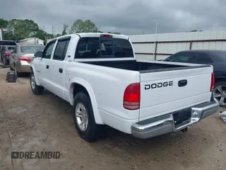 2000 Dodge Dakota Sport with VIN 1B7GL2AN4YS691223, listed as a IAAI auction lot 41964561 with 169,936 mi miles. Bid and sale history available at carsss.com. Image 3.
