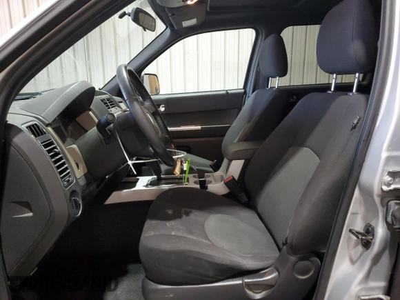 2008 Mercury Mariner with VIN 4M2CU81Z18KJ45619, listed as a Copart auction lot 52230575 with 255,957 mi miles and Salvage title. Bid and sale history available at DreamBid. Image 7.