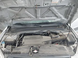 2004 Honda Pilot LX z VIN 2HKYF18154H587485, wystawiony jako IAAI lot #42407918 z przebiegiem 239 172 mil mil oraz . Historia ofert i sprzedaży dostępna na DreamBid. Obrazek 10.
