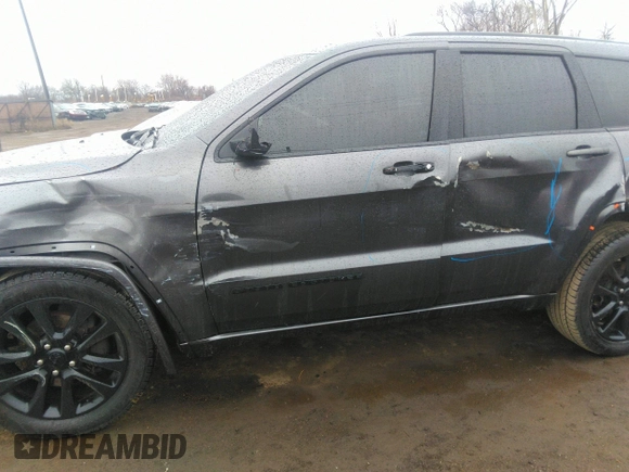 2017 Jeep Grand Cherokee Altitude with VIN 1C4RJFAG2HC926896, listed as a IAAI auction lot 41810504 with 100,337 mi miles and . Bid and sale history available at DreamBid. Image 6.