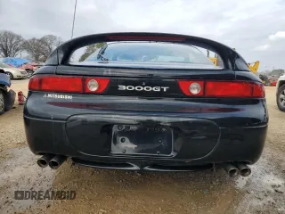 1998 Mitsubishi 3000GT z VIN JA3AM44H4WY004772, wystawiony jako Copart lot #44151245 z przebiegiem 51 090 mil mil oraz Szkoda całkowita • Salvage title. Historia ofert i sprzedaży dostępna na DreamBid. Obrazek 6.