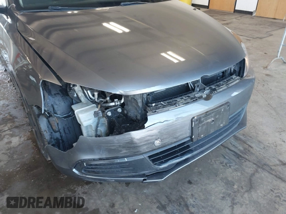 2014 Volkswagen Jetta Sedan S with VIN 3VW2K7AJ5EM410491, listed as a IAAI auction lot 42083614 with 65,960 mi miles. Bid and sale history available at carsss.com. Image 6.
