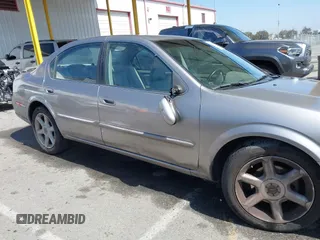 2001 Nissan Maxima GXE with VIN JN1CA31D41T815592, listed as a IAAI auction lot 42465005 with 96,822 mi miles and . Bid and sale history available at DreamBid. Image 13.
