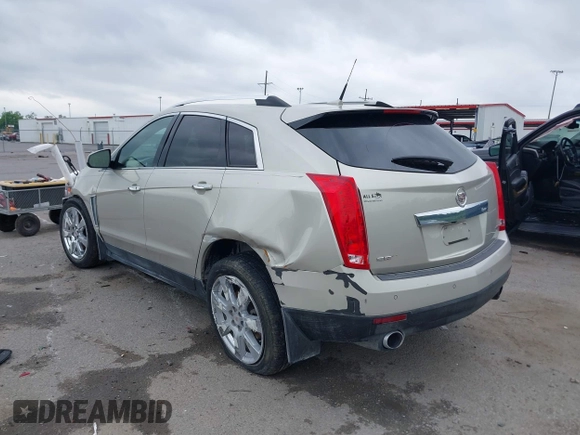 2014 Cadillac SRX Performance Collection z VIN 3GYFNCE35ES610504, wystawiony jako IAAI lot #42133548 z przebiegiem 140 306 mil mil oraz . Historia ofert i sprzedaży dostępna na DreamBid. Obrazek 3.