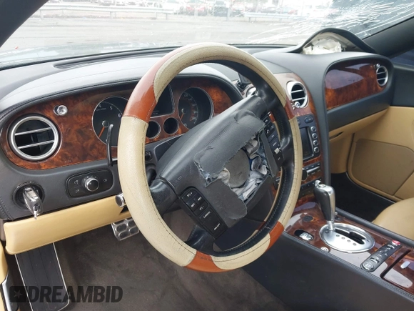 2005 Bentley Continental GT GT z VIN SCBCR63W55C025099, wystawiony jako IAAI lot #42208951 z przebiegiem 123 712 mil mil oraz . Historia ofert i sprzedaży dostępna na DreamBid. Obrazek 19.