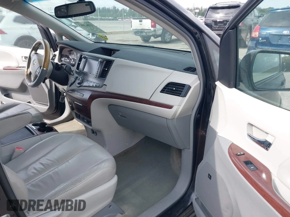 2011 Toyota Sienna XLE AAS with VIN 5TDYK3DC2BS150565, listed as a IAAI auction lot 41845965 with 279,253 mi miles and . Bid and sale history available at DreamBid. Image 5.
