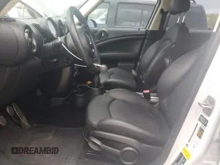 2014 MINI Countryman S z VIN WMWZC3C57EWP51864, wystawiony jako Copart lot #71233944 z przebiegiem 73 828 mil mil oraz Szkoda całkowita • Salvage title. Historia ofert i sprzedaży dostępna na DreamBid. Obrazek 7.