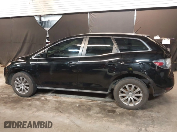2011 Mazda CX-7 i Sport z VIN JM3ER2BM7B0393190, wystawiony jako IAAI lot #42402082 z przebiegiem 152 473 mil mil oraz . Historia ofert i sprzedaży dostępna na DreamBid. Obrazek 14.