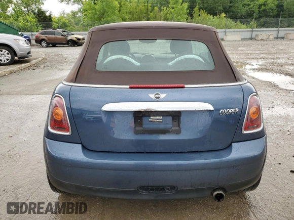 2009 MINI Convertible with VIN WMWMR33579TU96147, listed as a Copart auction lot 60124945 with 94,612 mi miles and Non repairable. Bid and sale history available at DreamBid. Image 6.