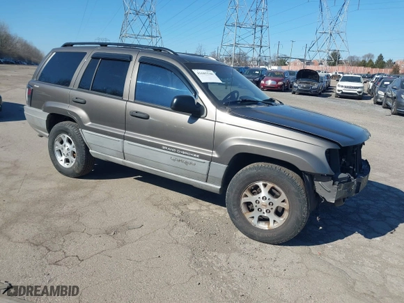 1999 Jeep Grand Cherokee Laredo with VIN 1J4GW58NXXC623753, listed as a IAAI auction lot 41685540 with 190,134 mi miles. Bid and sale history available at carsss.com. Image 1.