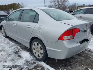 2011 Honda Civic Sdn LX with VIN 2HGFA1F54BH520203, listed as a IAAI auction lot 41708981 with 176,451 mi miles. Bid and sale history available at carsss.com. Image 3.