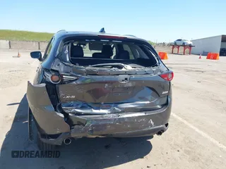 2017 Mazda CX-5 Grand Touring with VIN JM3KFADL6H0217850, listed as a IAAI auction lot 42033404 with 74,198 mi miles and . Bid and sale history available at carsss.com. Image 6.
