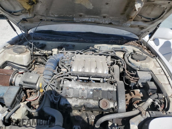 1991 Mitsubishi 3000GT z VIN JA3XD64B4MY014247, wystawiony jako Copart lot #76901044 z przebiegiem 208 743 mil mil oraz Czysty tytuł • Clean title. Historia ofert i sprzedaży dostępna na DreamBid. Obrazek 11.