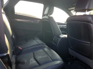 2022 Cadillac XT5 FWD Luxury z VIN 1GYKNAR47NZ100986, wystawiony jako Copart lot #83144574 z przebiegiem Nie podano mil oraz Nie do naprawy • Non repairable. Historia ofert i sprzedaży dostępna na DreamBid. Obrazek 11.