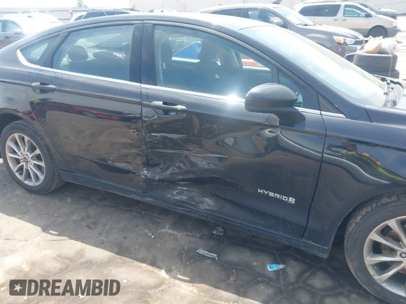 2017 Ford Fusion Hybrid SE with VIN 3FA6P0LU4HR358501, listed as a IAAI auction lot 42287032 with 165,456 mi miles and . Bid and sale history available at DreamBid. Image 6.