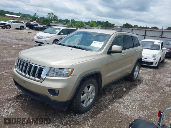 2011 Jeep Grand Cherokee Laredo with VIN 1J4RR4GG8BC558018, listed as a IAAI auction lot 42347367 with 180,334 mi miles and . Bid and sale history available at DreamBid. Image 2.