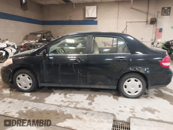 2007 Nissan Versa 1.8 SL with VIN 3N1BC11E47L411983, listed as a IAAI auction lot 41391334 with 201,830 mi miles. Bid and sale history available at carsss.com. Image 12.