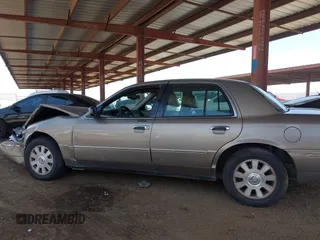 2003 Mercury Grand Marquis LS Premium with VIN 2MEFM75W23X613004, listed as a IAAI auction lot 41974625 with 151,023 mi miles and . Bid and sale history available at DreamBid. Image 14.