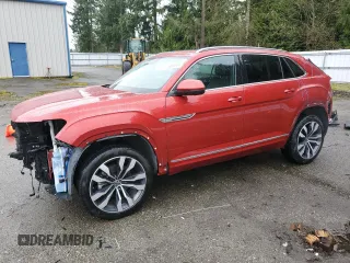 2022 Volkswagen Atlas SEL Premium R-Line with VIN 1V2FE2CA6NC221165, listed as a Copart auction lot 51166865 with 23,670 mi miles and Salvage title. Bid and sale history available at DreamBid. Image 1.