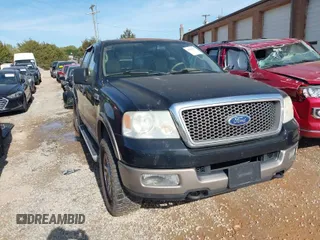 2005 Ford F-150 XLT with VIN 1FTPW14515KD71446, listed as a IAAI auction lot 41910372 with 113,725 mi miles. Bid and sale history available at carsss.com. Image 1.