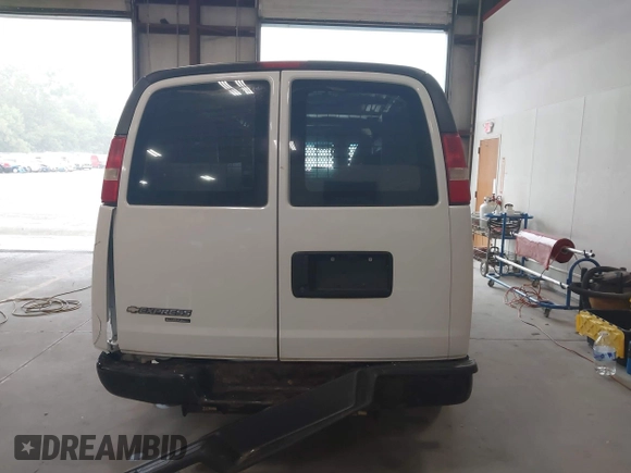 2013 Chevrolet Express Cargo z VIN 1GCWGFBA8D1101785, wystawiony jako IAAI lot #42617920 z przebiegiem 164 366 mil mil oraz . Historia ofert i sprzedaży dostępna na DreamBid. Obrazek 16.