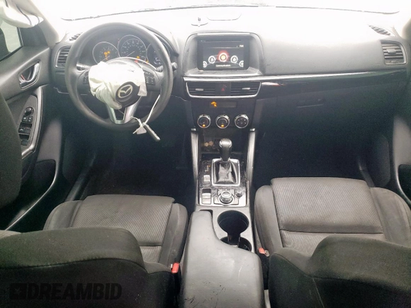 2016 Mazda CX-5 Sport с VIN JM3KE4BY3G0779206, выставлен на аукционе Copart как лот 58854805 с пробегом 144 434 миль миль и Чистый • Clean title. История ставок и продаж доступна на DreamBid. Изображение 8.