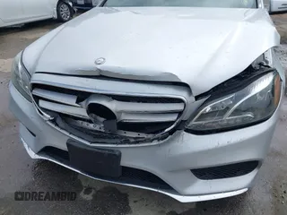 2014 Mercedes-Benz E with VIN WDDHF5KB8EB009303, listed as a IAAI auction lot 42014846 with 97,214 mi miles. Bid and sale history available at carsss.com. Image 17.