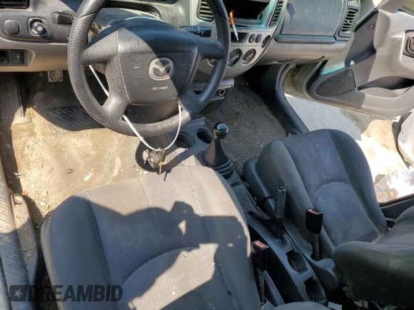 2004 Mazda Tribute DX with VIN 4F2YZ02B74KM13874, listed as a Copart auction lot 65422864 with 288,215 mi miles and Salvage Title. Bid and sale history available at carsss.com. Image 8.