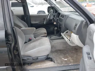 2000 Mitsubishi Montero Sport LS with VIN JA4LS31H0YP809623, listed as a IAAI auction lot 41821577 with 84,850 mi miles. Bid and sale history available at carsss.com. Image 5.