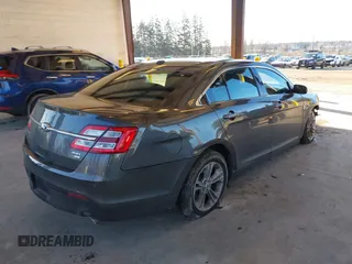 2018 Ford Taurus SEL with VIN 1FAHP2H82JG112785, listed as a IAAI auction lot 41376074 with 98,754 mi miles. Bid and sale history available at carsss.com. Image 4.