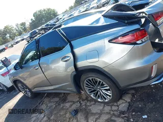 2020 Lexus RX with VIN JTJJGKFA7L2013877, listed as a IAAI auction lot 40678497 with 67,271 mi miles. Bid and sale history available at carsss.com. Image 14.